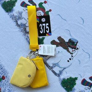 375,NWT Lululemon Dual Pouch Wristlet Yellow